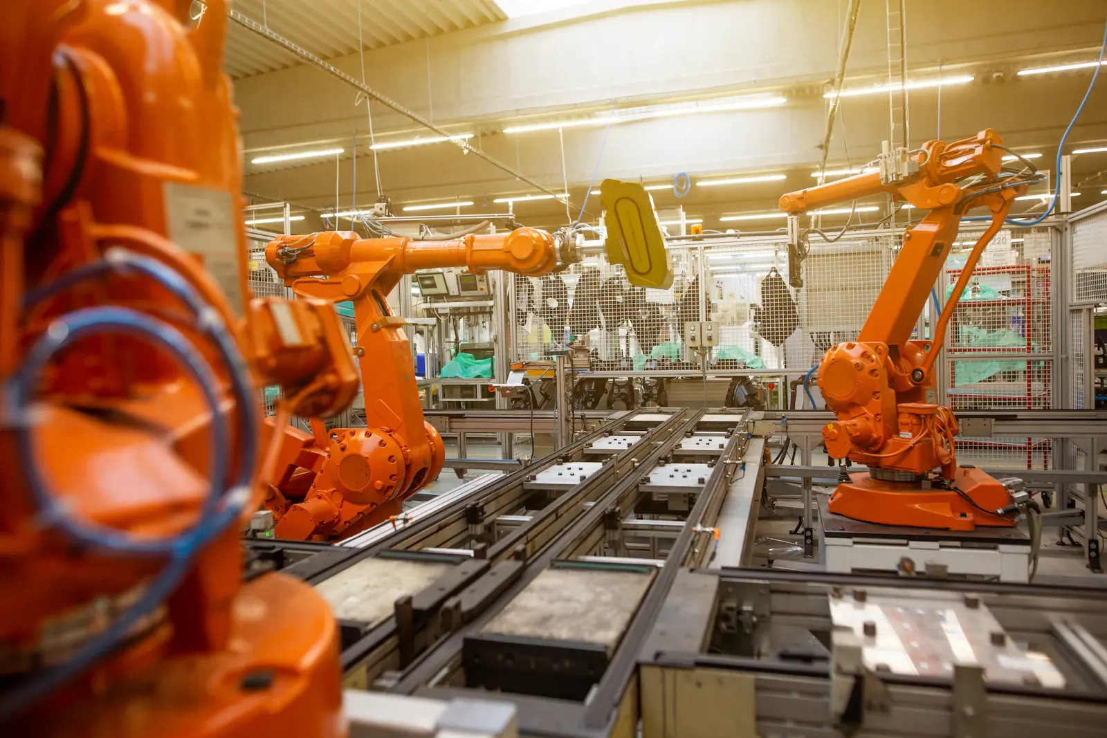 Factory floor filled with orange machines