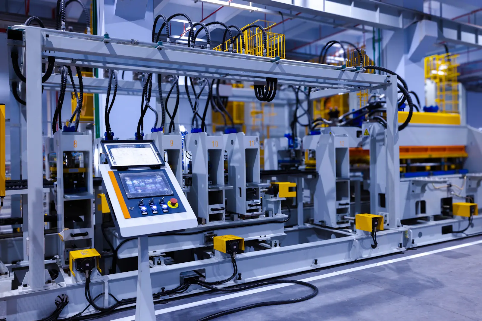 Touchscreen control panel on an industrial manufacturing machine